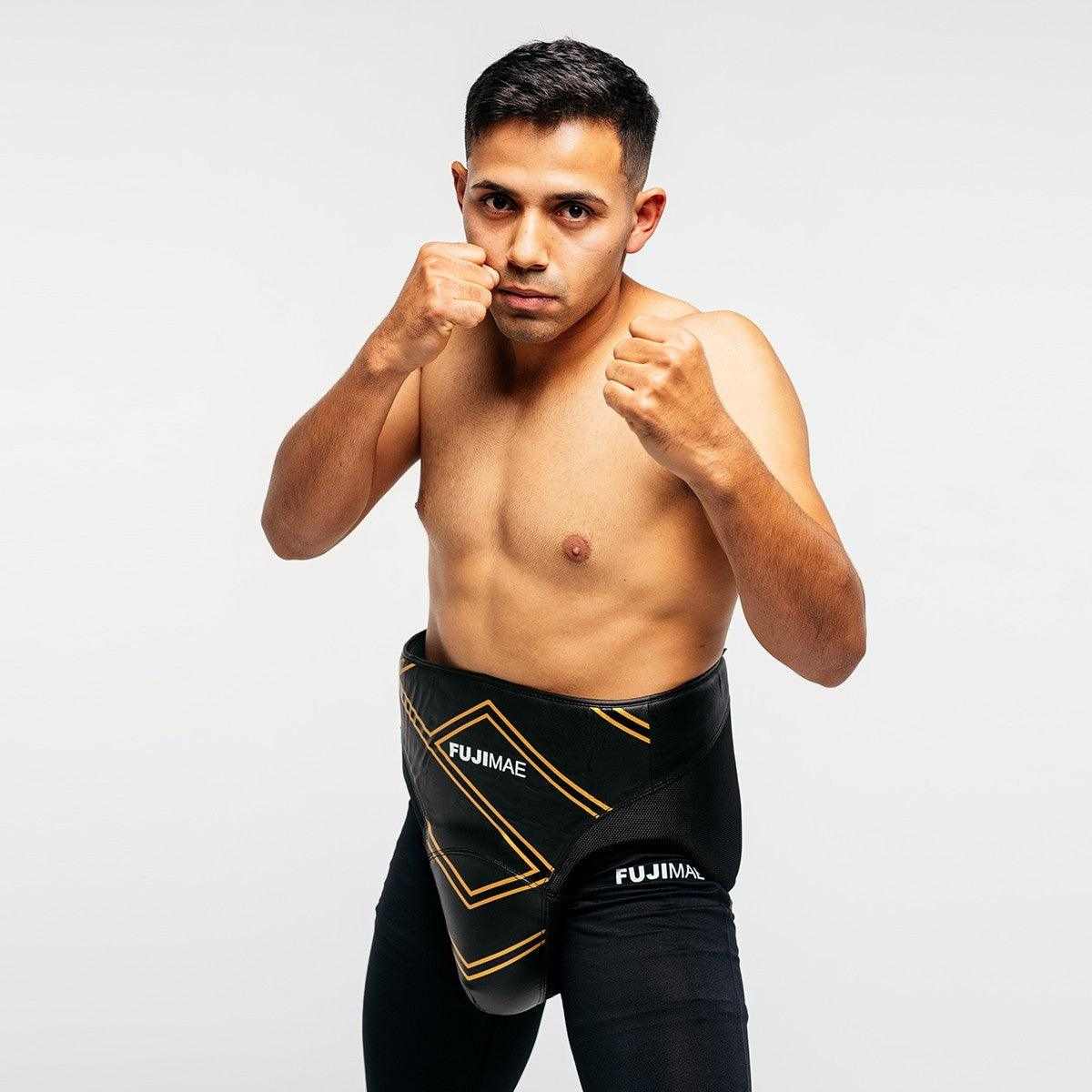 Man wearing FUJIMAE professional boxing sparring protective groin guard in fighting stance