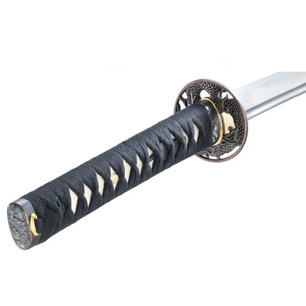 Close-up of the black handle and ornate dragon-patterned tsuba on the Iaïto Bushiden training sword with a carbon steel blade.