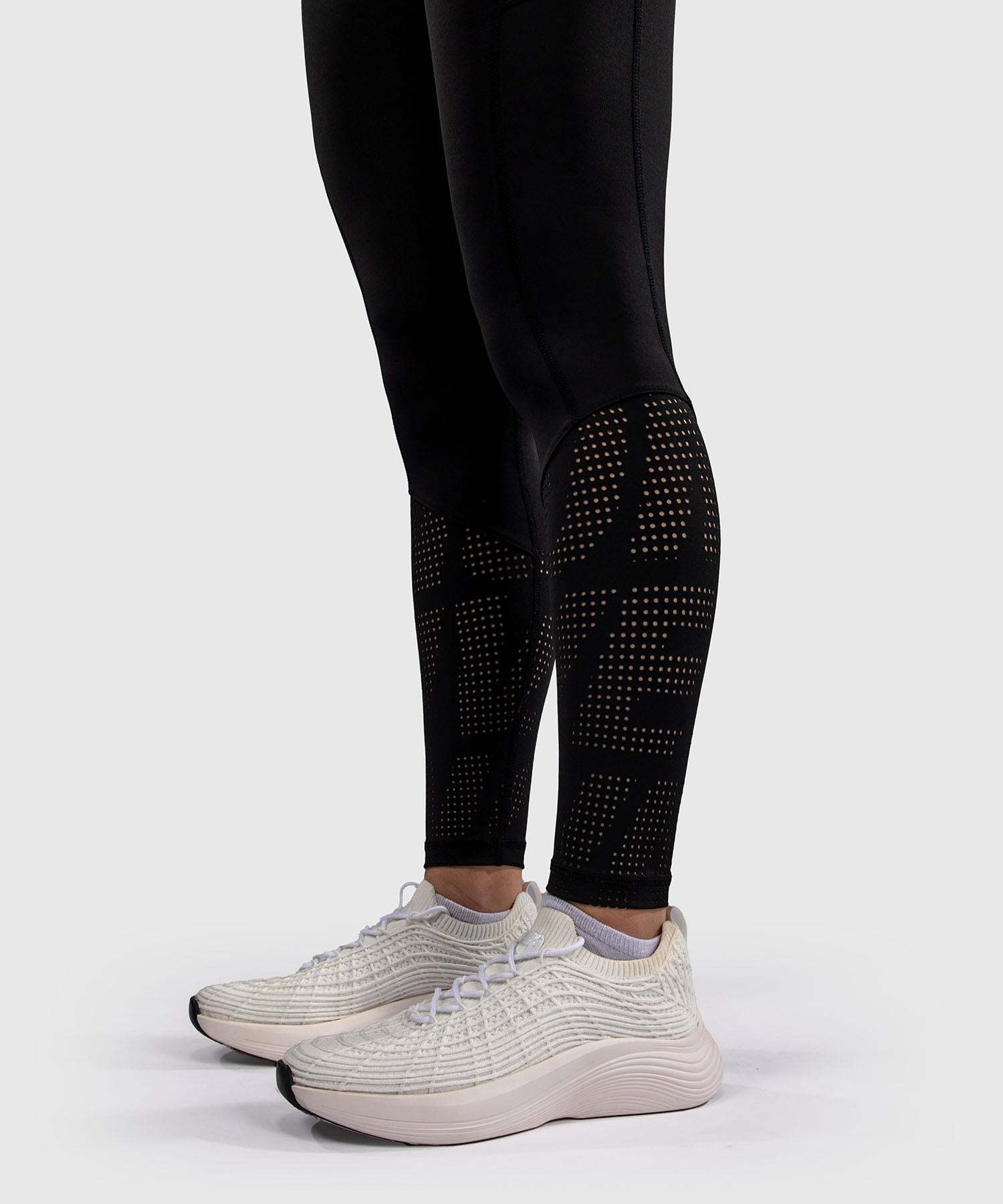 Legging Venum Lazer noir et jaune pour femme, compression et maintien optimal pour MMA et grappling