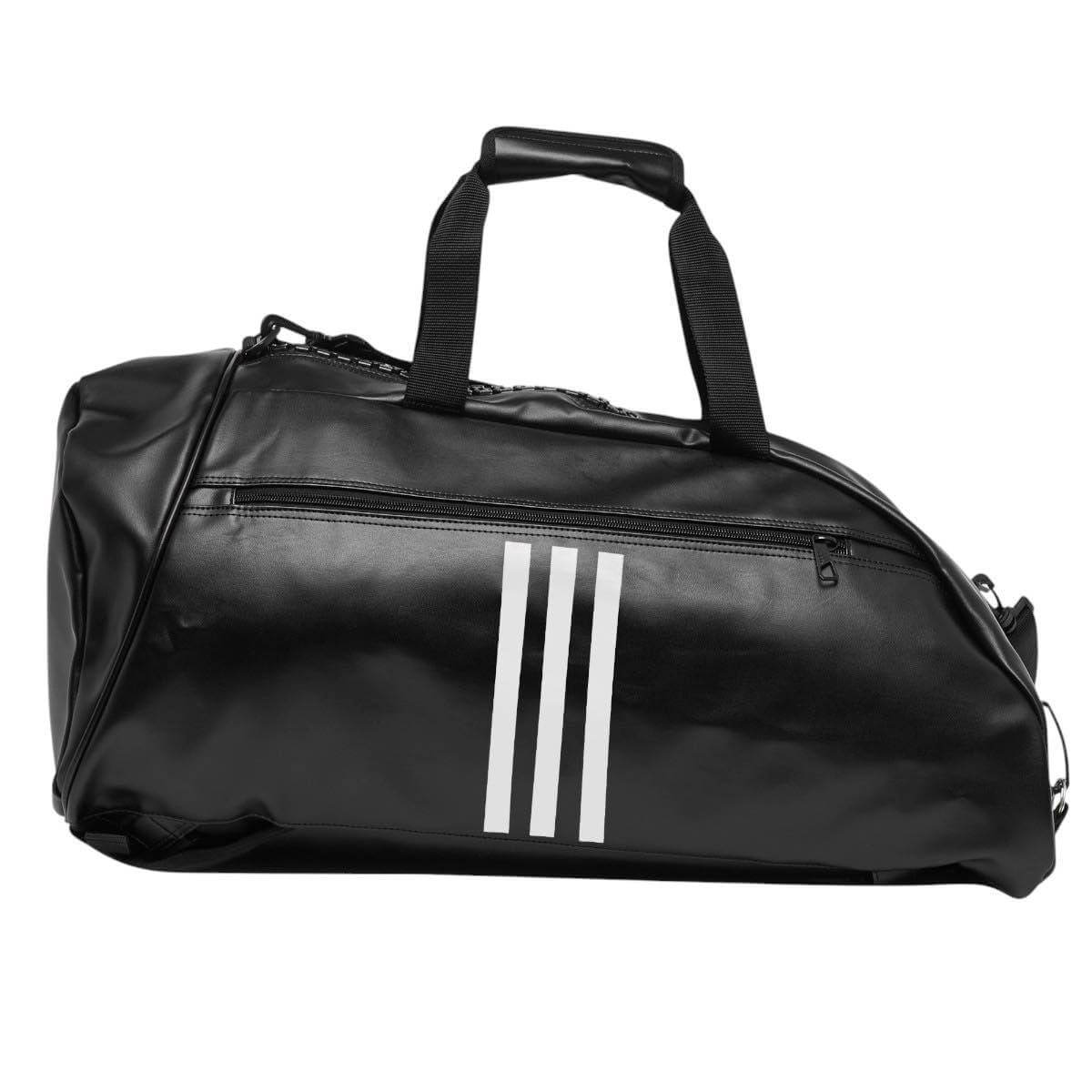 Black Adidas Combat 2-in-1 training bag with white stripes and large zippered opening, convertible into a backpack.