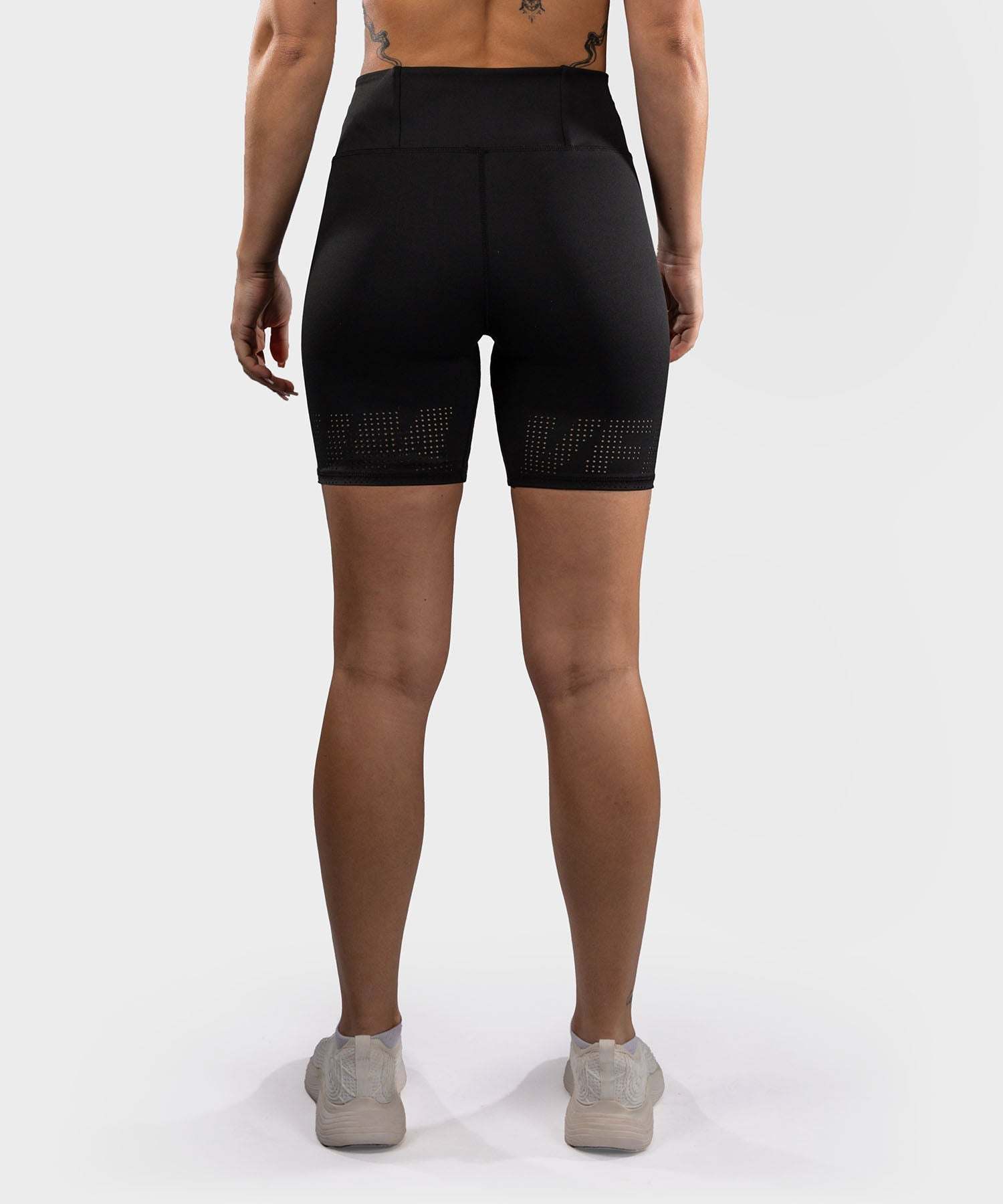 Short de Compression Venum Lazer pour femme noir et jaune, idéal training et cardio, maintien stable et respirant.