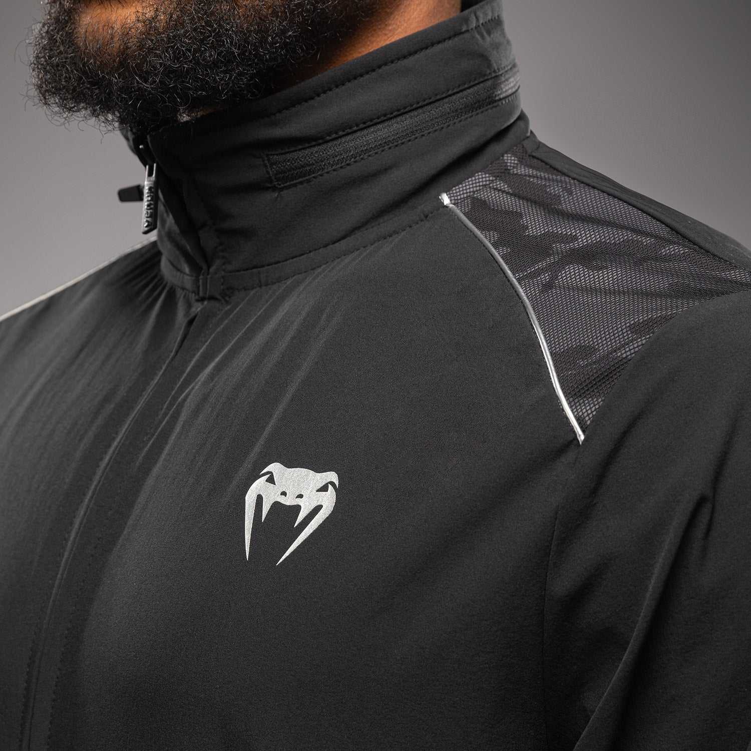 Veste de survêtement Venum x Polaris noir et gris, coupe ajustée, confortable et respirante pour sport et quotidien