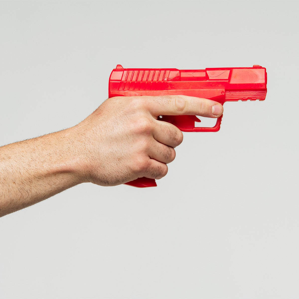 Détail du caoutchouc TPR du pistolet d'entraînement FUJIMAE rouge